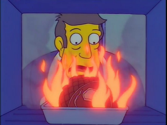 Principal Skinner looking in on a roast in flames. Ye gods his roast is ruined!